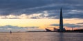 Beautiful evening panorama with a great skyscraper on the seashore