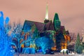 beautiful evening park with a church with illuminated trees wroclaw