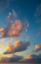 Beautiful evening sky. Clouds in sunset with pink lights Royalty Free Stock Photo