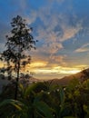 A beautiful evening sky and mountain view with arising mist.