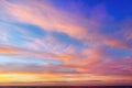 Beautiful evening sky with pink clouds. Sunset over the sea Royalty Free Stock Photo
