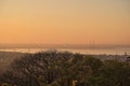 Beautiful evening view of Dublin Bay, Covanta Plant Dublin waste to energy, construction cranes and tree branches Royalty Free Stock Photo