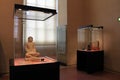 Beautiful exhibit of Egyptian artifacts in huge glass encased pedestals,The Louvre,Paris,France,2016