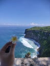Beautiful and exotic beaches at Uluwatu Bali, high steep cliffs and beaches that blend with nature.