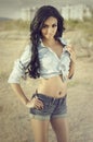 Beautiful exotic young wearing denim