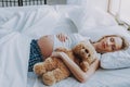 Beautiful expectant mother having rest on bed Royalty Free Stock Photo