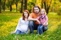 Beautiful expecting family in autumn park Royalty Free Stock Photo