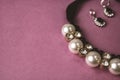 Beautiful expensive precious shiny jewelry fashionable glamorous jewelry, necklace and earrings with pearls and diamonds