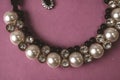 Beautiful expensive precious shiny jewelry fashionable glamorous jewelry, necklace and earrings with pearls and diamonds