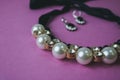 Beautiful expensive precious shiny jewelry fashionable glamorous jewelry, necklace and earrings with pearls and diamonds