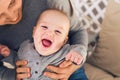 Beautiful expressive adorable happy cute laughing smiling baby infant face Royalty Free Stock Photo