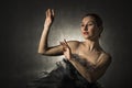 Beautiful expressive ballerina in the role of a black swan Royalty Free Stock Photo