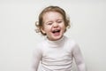 Beautiful expressive happy cute laughing smiling baby infant face Royalty Free Stock Photo