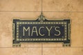 Beautiful exterior view of Macy`s sign on wall of store in New York.