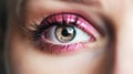 Beautiful eye trendy pink glitter makeup and black long eyelashes, barbicor style. Part of a woman& x27;s face close-up