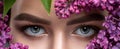 Beautiful eyes of a woman with make-up close-up. Long-lasting styling of the eyebrows. Eyebrow lamination. Professional make-up