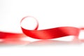 Beautiful fabric red ribbon on white