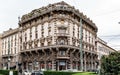 Beautiful facade of a corner building. Milan, Italy