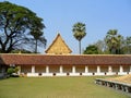 Beautiful facade of Wat That Luang Nua buddhist temple as seen from PhaThat Luang stupa in Vientiane, Laos