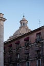 For the beautiful facades of buildings can be seen a majestic dome of Church Badia Saint Agata. Catania. Sicily. Italy