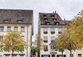 Beautiful facades of historic houses at the old town of Swiss City of Schaffhausen on a foggy winter day.