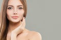 Beautiful face closeup. Healthy model woman with clear skin and healthy hair. Skincare and facial treatment concept Royalty Free Stock Photo