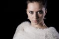 Portrait of beauty woman in luxury white fur coat Royalty Free Stock Photo