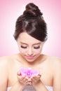 Beautiful face with pink orchids Royalty Free Stock Photo