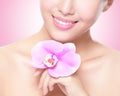 Beautiful face with pink orchids Royalty Free Stock Photo