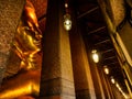 Beautiful face of Reclining Buddha, and thai art architecture in Wat Phra Chetupon Vimolmangklararm Wat Pho temple They are