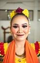 beautiful face of a traditional Indonesian dancer wearing flowers and charming makeup before performing Royalty Free Stock Photo