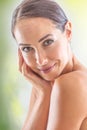 Beautiful face of young adult woman with clean skin without make-up. Spa skincare wellness and cosmetics concept