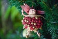 Beautiful fairy decoration toy on the artificial Christmas tree Royalty Free Stock Photo