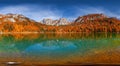 beautiful fairytale landscape in autumn with a large lake with crystal blue water