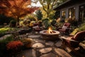 Beautiful fall garden, residential backyard with outdoor chairs and fire-pit with flame, cozy autumn lanscape design