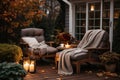 Beautiful fall residential backyard terrace with outdoor chairs, cozy autumn vibes