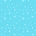 Beautiful falling snowflakes on blue sky seamless pattern.