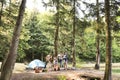 Beautiful family camping in forest.