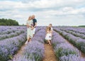 Beautiful family of four with two children in a field of lavender