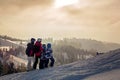 Beautiful family with kids, skiing in a scenery area in Austrian