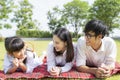 Beautiful family portrait smiling outside their new house with sunset Royalty Free Stock Photo