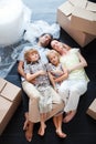 Beautiful family sleeping on the floor