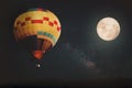 Beautiful fantasy of hot air balloon and full moon with milky way star in night skies