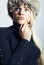 Beautiful Fashion Blond Woman in Fur. Beauty Girl. Winter Style. Red Manicure. Make-up Royalty Free Stock Photo