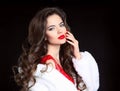 Beautiful Fashion brunette Girl portrait in white Mink Fur Coat. Royalty Free Stock Photo