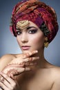 Beautiful fashion east woman portrait with oriental accessories Royalty Free Stock Photo