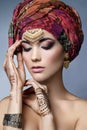 Beautiful fashion east woman portrait with oriental accessories Royalty Free Stock Photo