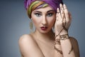 Beautiful fashion east woman portrait with oriental accessories Royalty Free Stock Photo