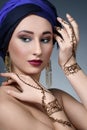 Beautiful fashion east woman portrait with oriental accessories Royalty Free Stock Photo