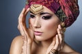 Beautiful fashion east woman portrait with oriental accessories Royalty Free Stock Photo